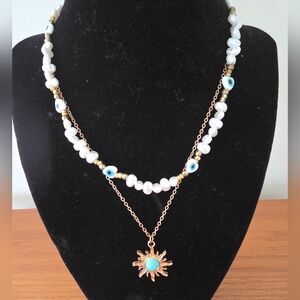 Elegant Pearl and Gold Necklace with Sun Pendant 2 In 1